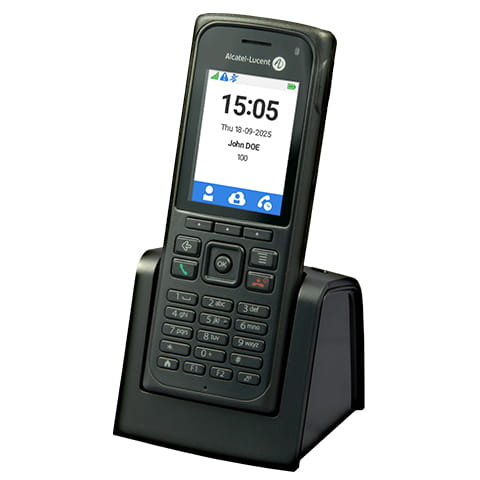 Alcatel-Lucent cordless phone on charging dock displaying time and user information.