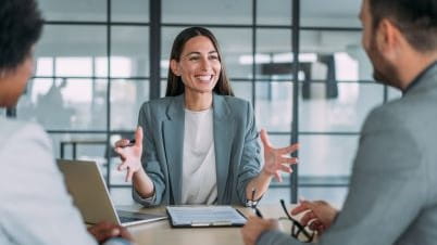 a person talking to a group of people