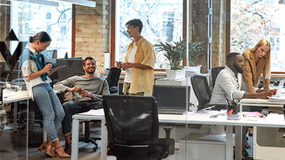 a group of people in an office