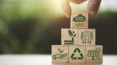 A hand and some building blocks.