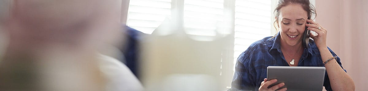 a person sitting in front of a laptop