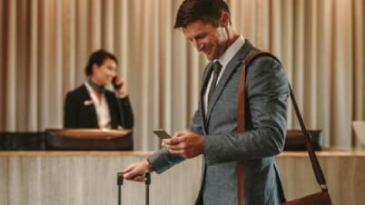 Man carrying a suitcase