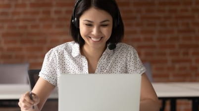 A woman working on her laptop A woman working on her laptop