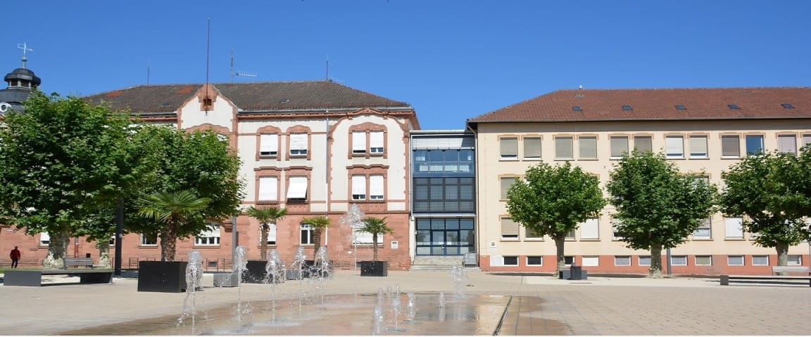 a building with trees in front of it