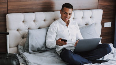 Man working from hotel room