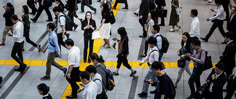 people crossing at crosswalk