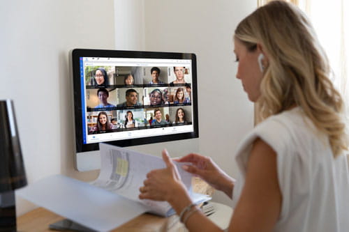 a person standing in front of a computer
