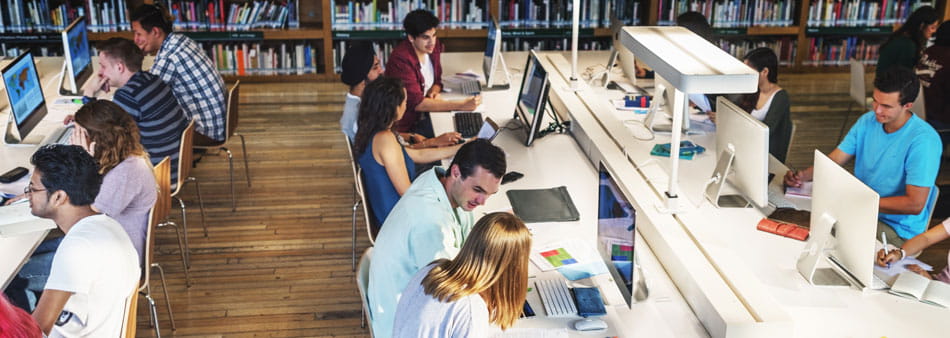 library room with students sitting and studying
