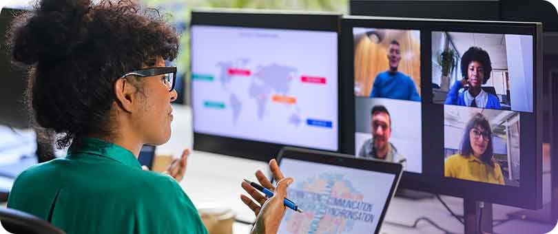 a woman looking at a screen
