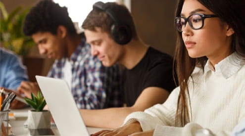 A student working on a laptop