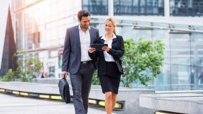 a man and a woman walking