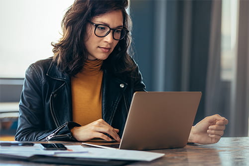 Woman working from home for blog
